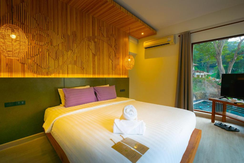 Кровать или кровати в номере Siam Bay Resort