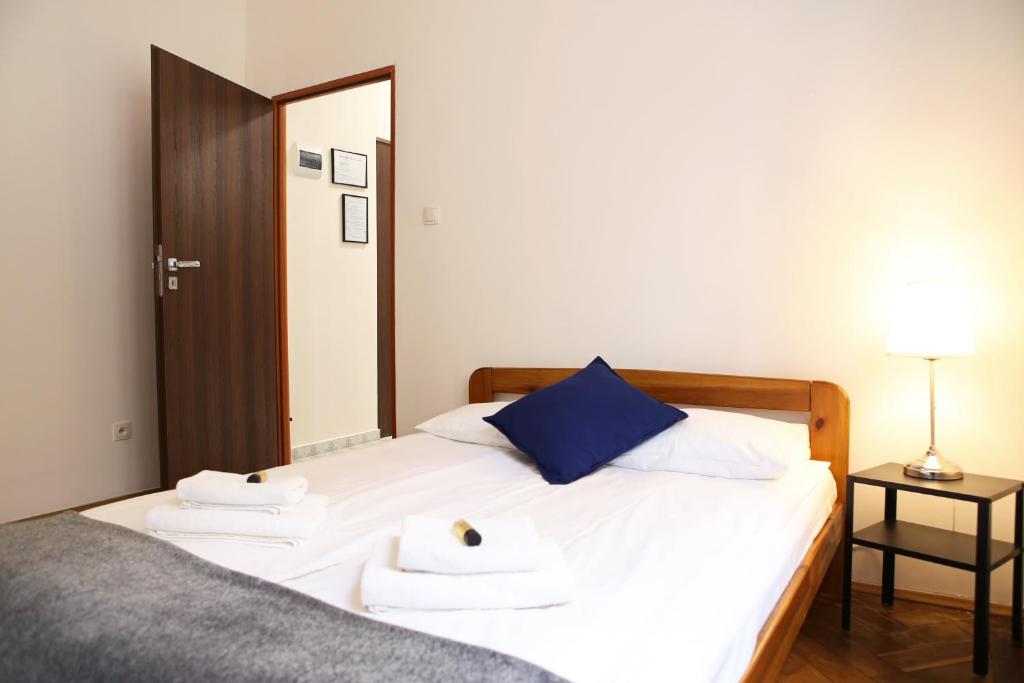 Posteľ alebo postele v izbe v ubytovaní Classic apartments Pilsudskiego street