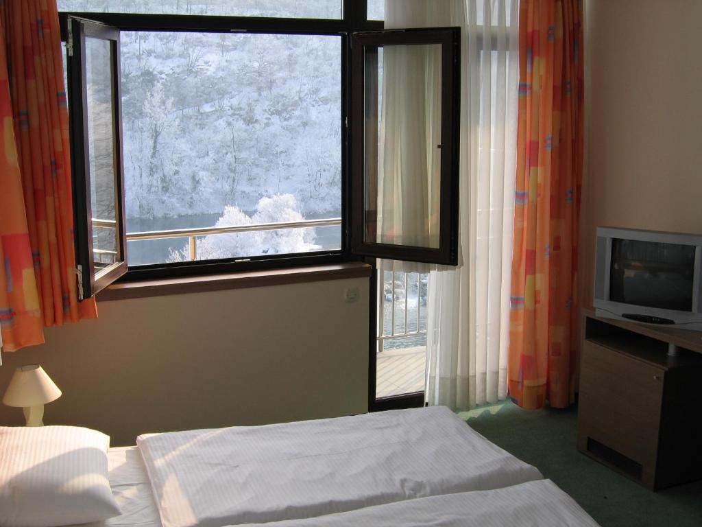 Postel nebo postele na pokoji v ubytování Bed & Breakfast Zeleni Kut