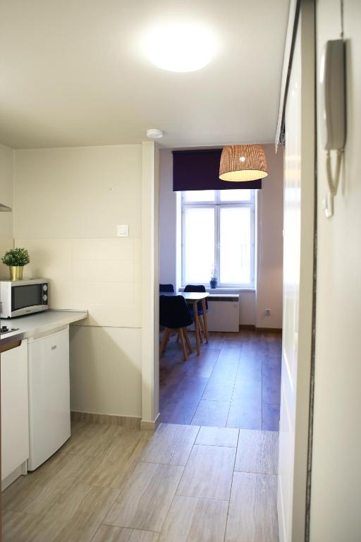 Kuchyňa alebo kuchynka v ubytovaní Classic apartments Pilsudskiego street