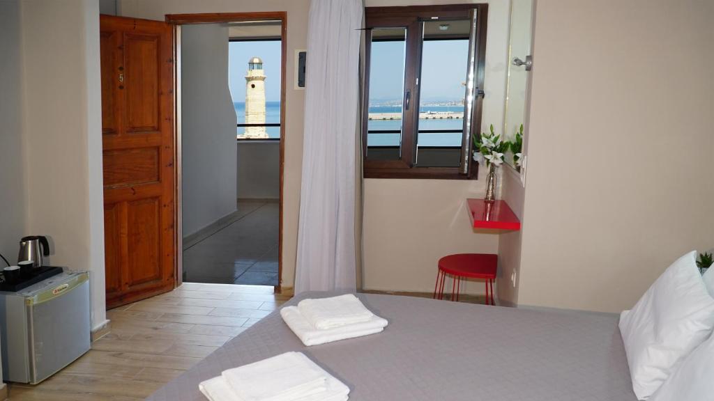 Postel nebo postele na pokoji v ubytování Faros Rooms