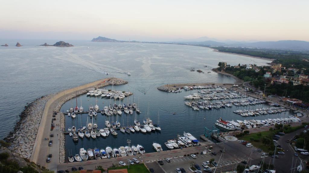an aerial view of a marina with boats in the water at Casa Turusele in Santa Maria Navarrese