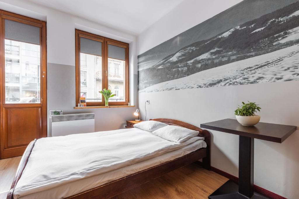 Posteľ alebo postele v izbe v ubytovaní Top Hostel Pokoje Gościnne