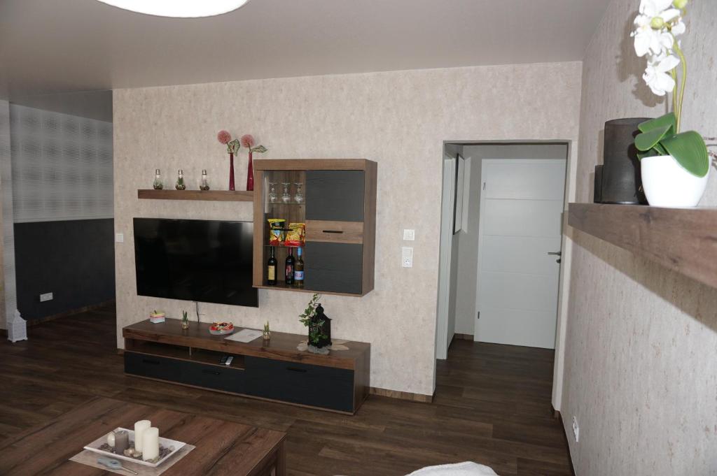 TV a/nebo společenská místnost v ubytování Super Erdgeschosswohnung