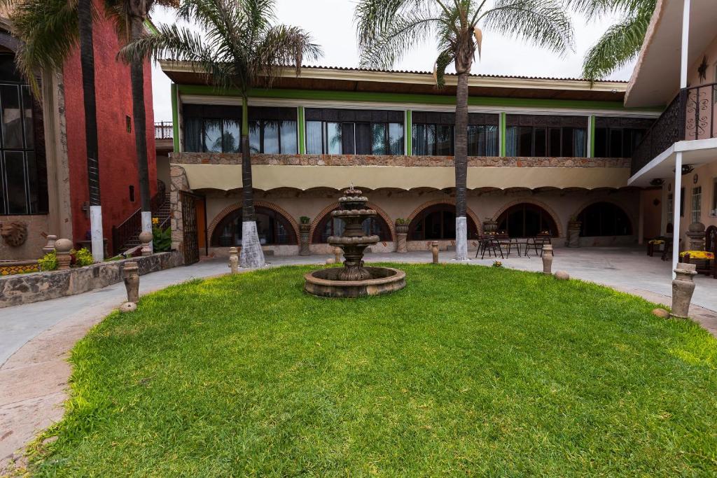 Zahrada ubytování Hotel Hacienda Tonalmain, Central Nueva