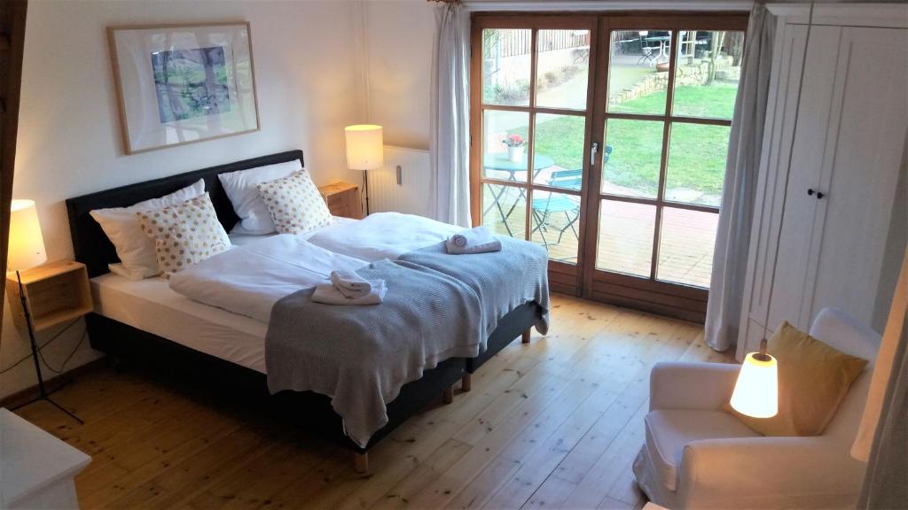 Ein Bett oder Betten in einem Zimmer der Unterkunft Ferienhof Trapp