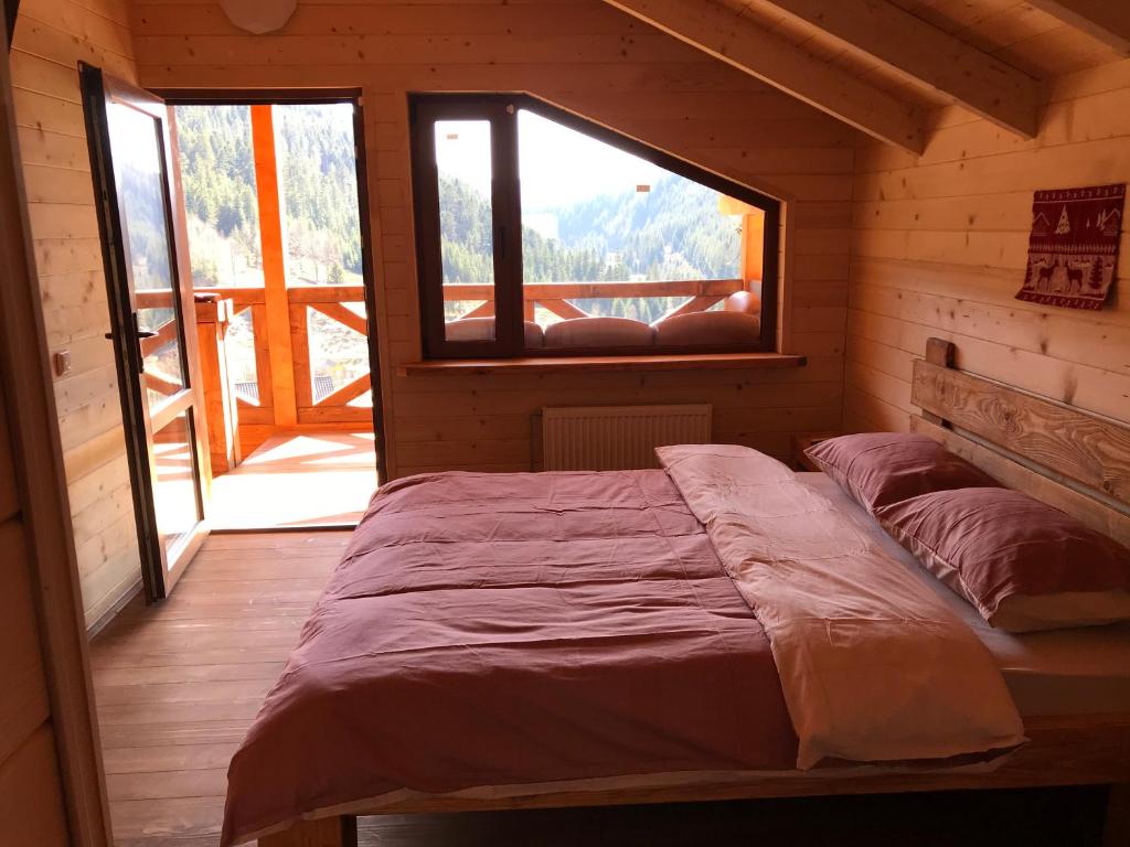 Postel nebo postele na pokoji v ubytování Kozichky Guest House