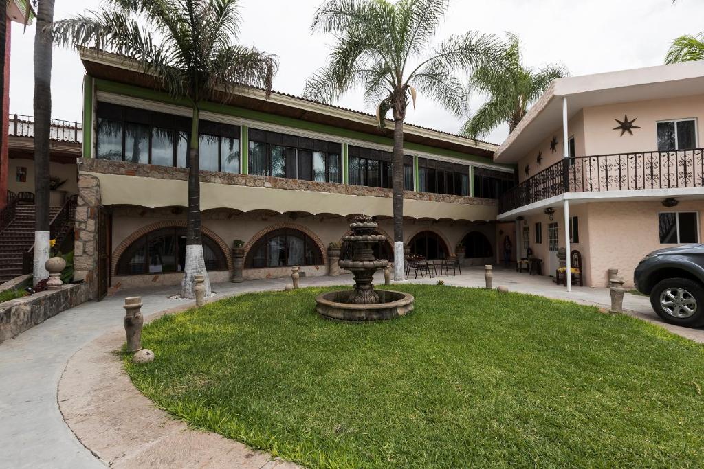 Zahrada ubytování Hotel Hacienda Tonalmain, Central Nueva