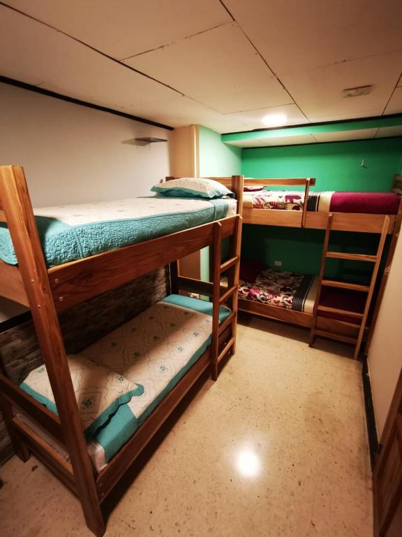 Postel nebo postele na pokoji v ubytování Toucan Hostel
