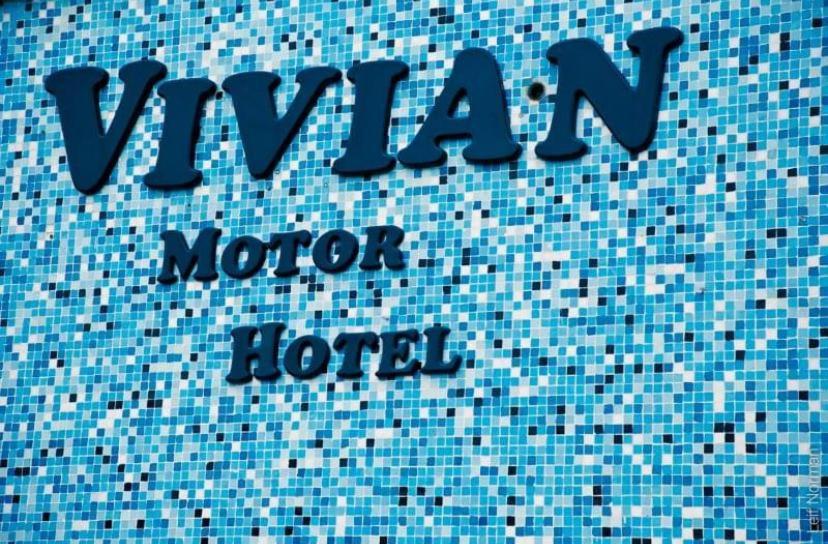 a close up of the words waarin morror hotel on a tile wall at Vivian Motor Hotel in Neepawa