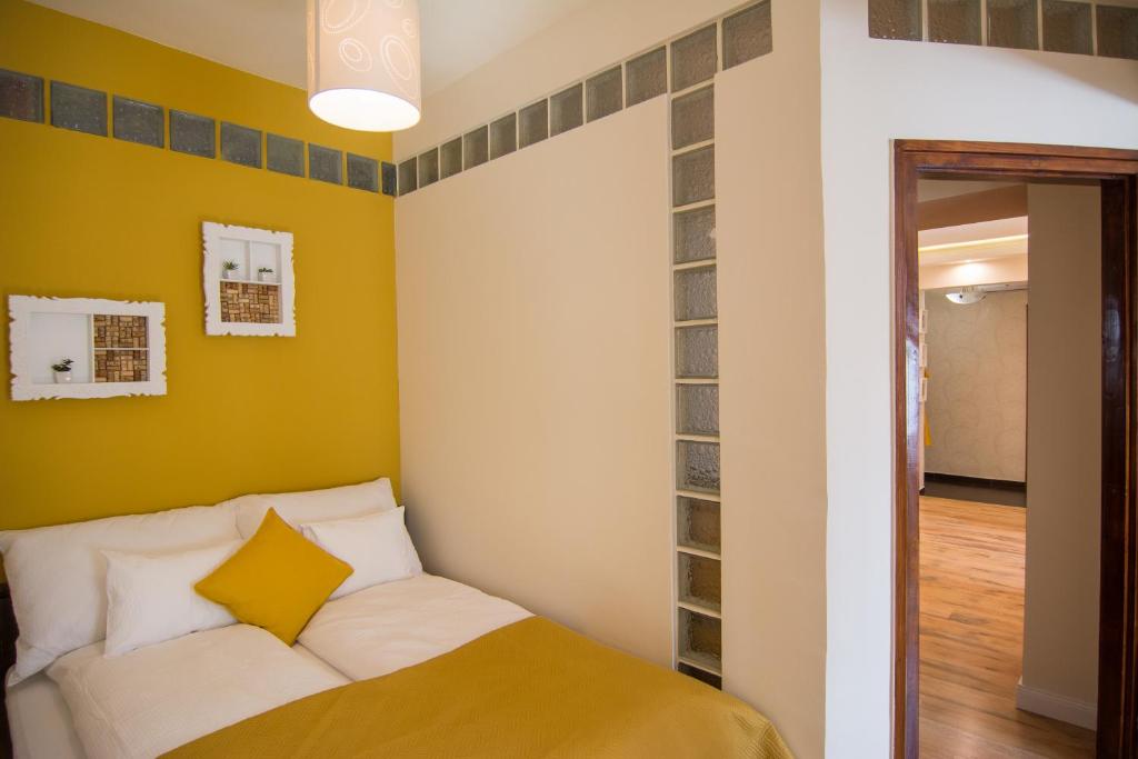 Posteľ alebo postele v izbe v ubytovaní Cork Apartman