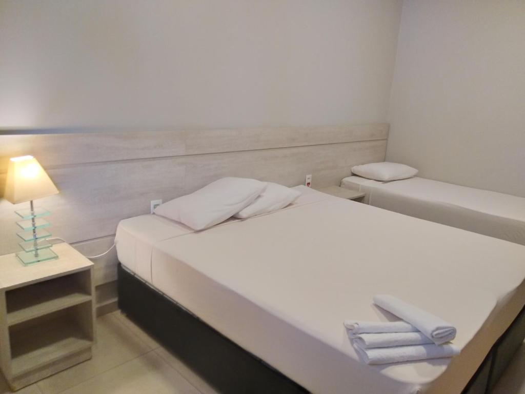 Postel nebo postele na pokoji v ubytování Sleep Hotel
