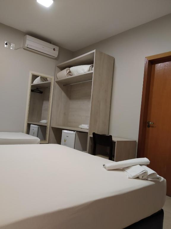 Postel nebo postele na pokoji v ubytování Sleep Hotel