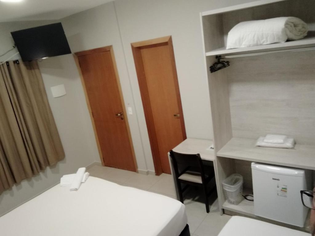 Postel nebo postele na pokoji v ubytování Sleep Hotel