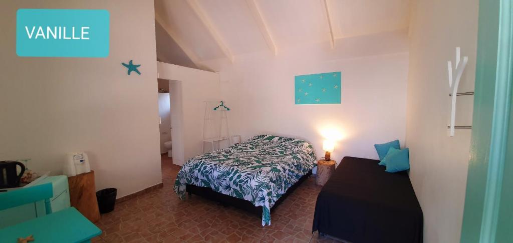 Postel nebo postele na pokoji v ubytování Hotel & Apartments "CHEZ HIVA"