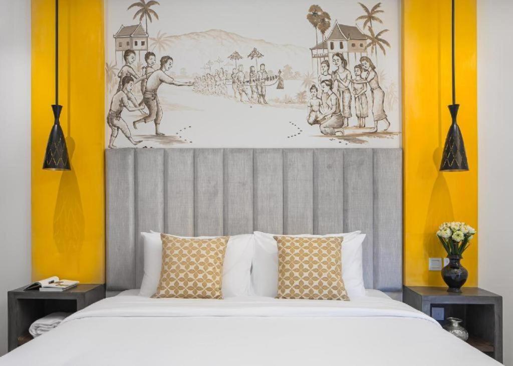 Postel nebo postele na pokoji v ubytování Siem Reap Palace Hotel & Spa