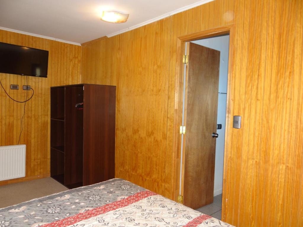TV a/nebo společenská místnost v ubytování Hostal Santa Fe