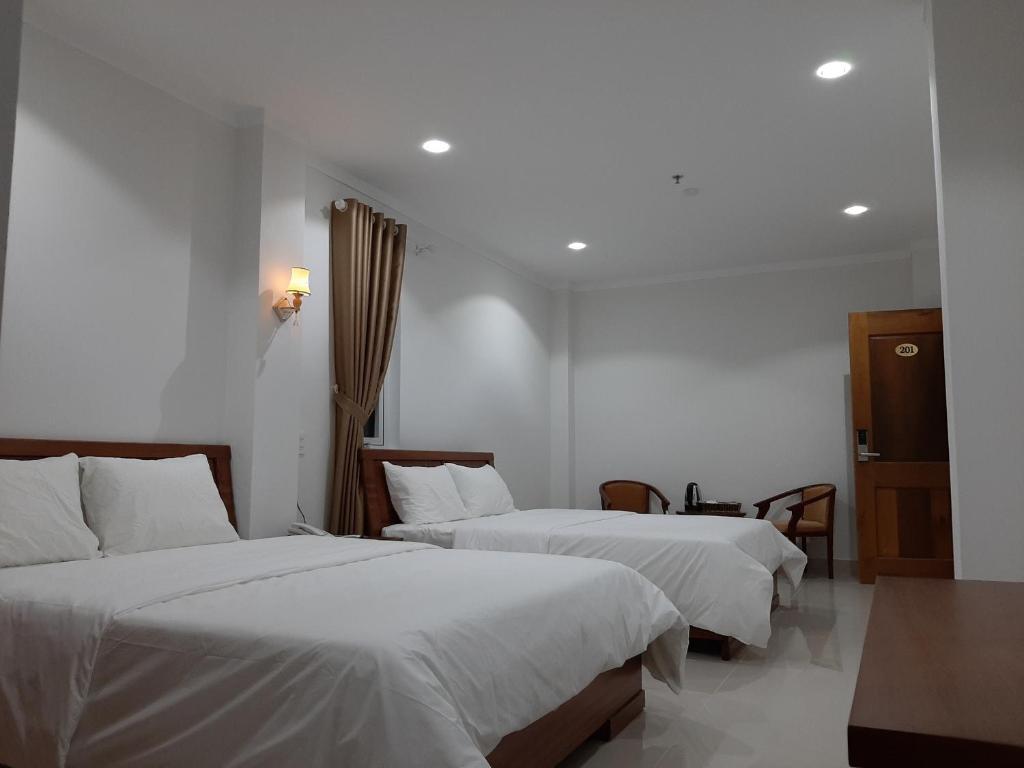 Minh Manh Hotel 2 - Komfort-Vierbettzimmer