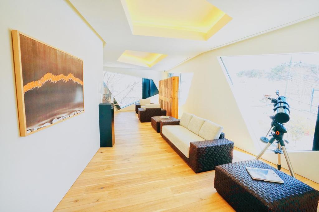 TV a/nebo společenská místnost v ubytování HOTEL KEYFOREST HOKUTO
