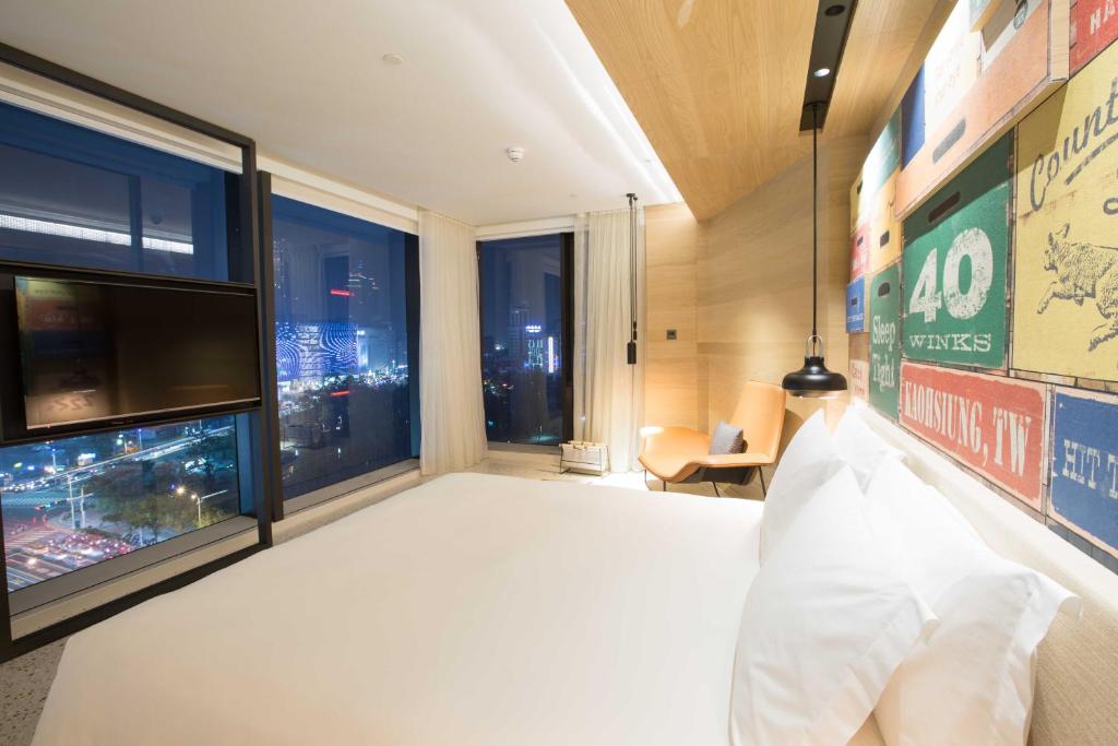 Postel nebo postele na pokoji v ubytování Hotel Indigo Kaohsiung Central Park by IHG