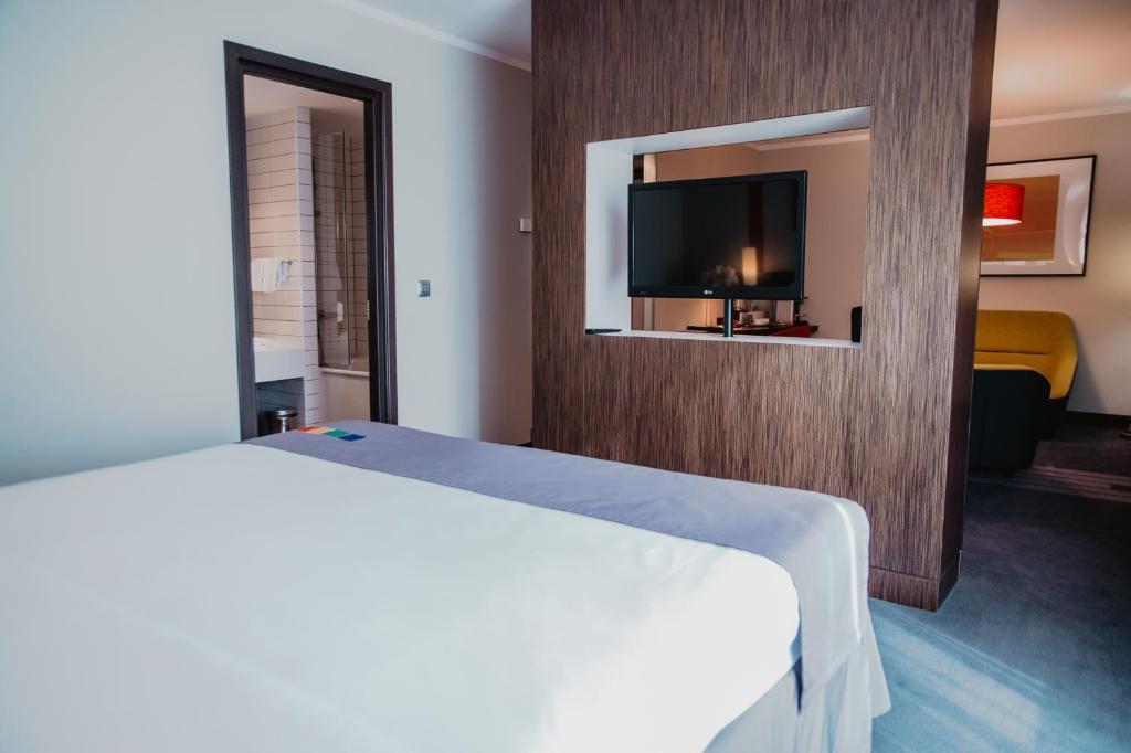 Кровать или кровати в номере Piter Inn
