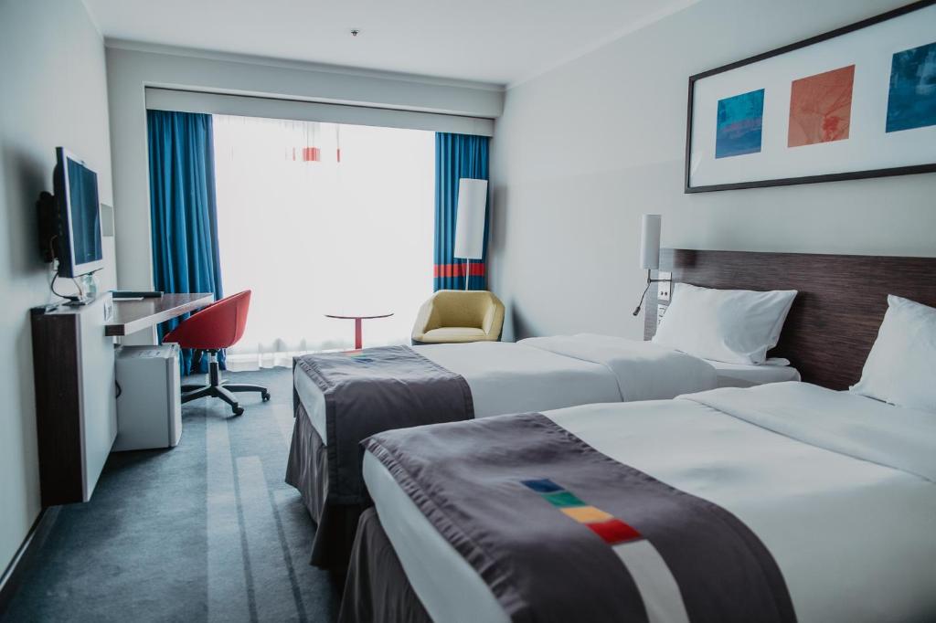 Кровать или кровати в номере Piter Inn