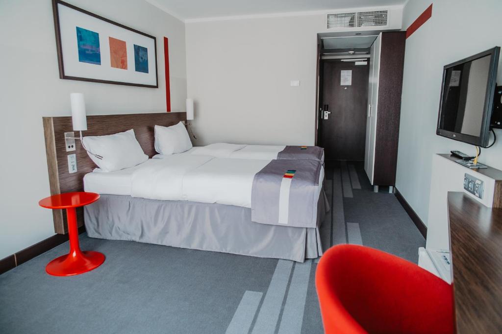 Кровать или кровати в номере Piter Inn