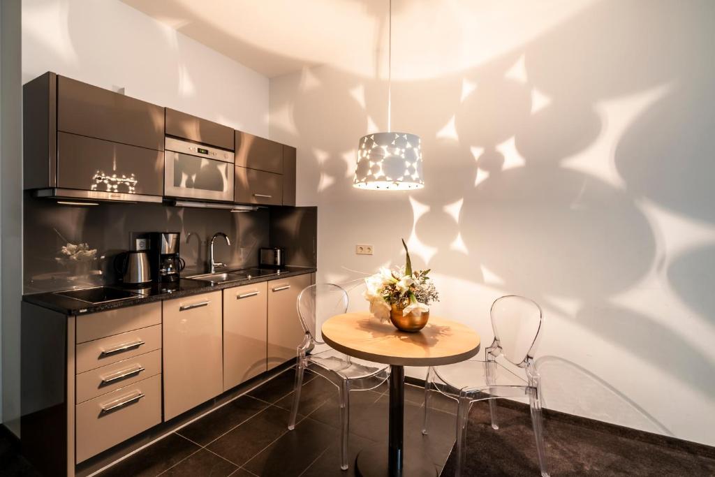 Aparthotel Am Schloss - Resim 26