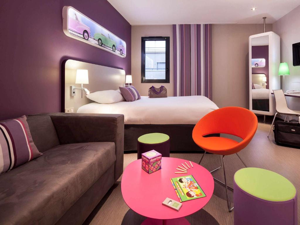 Postel nebo postele na pokoji v ubytování ibis Styles Montbéliard
