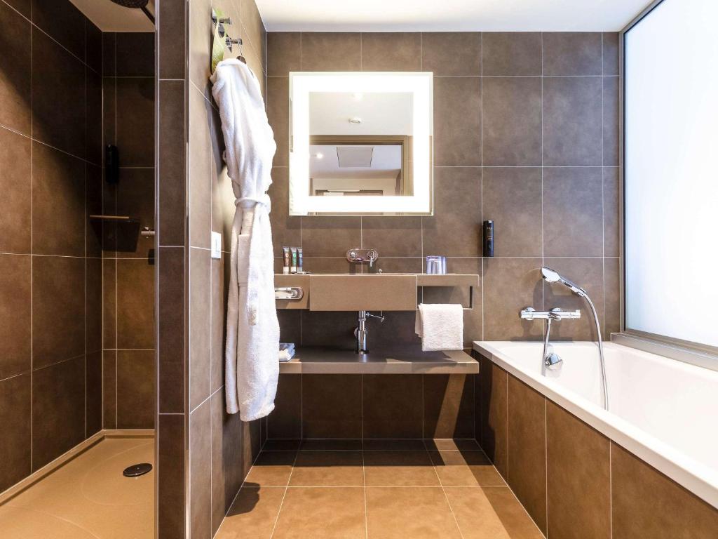 Koupelna v ubytování Novotel Basel City