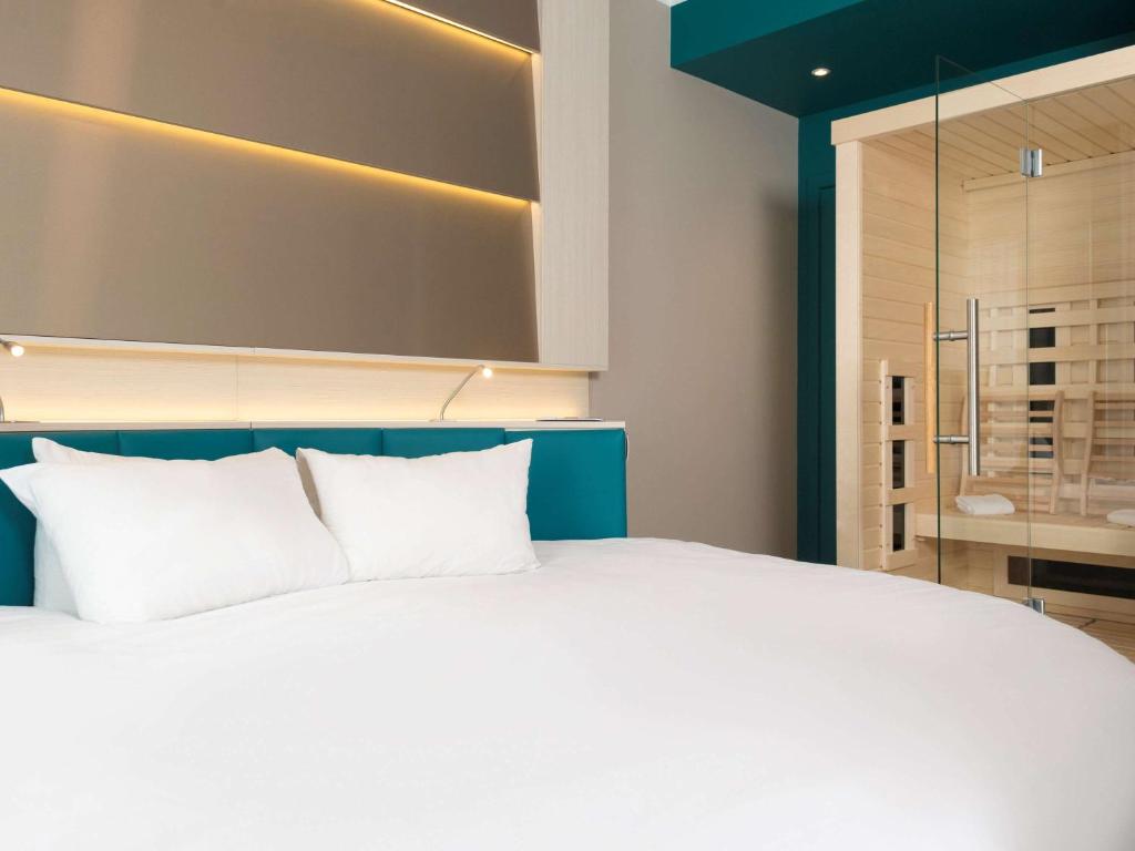 Postel nebo postele na pokoji v ubytování Ibis Styles Nivelles