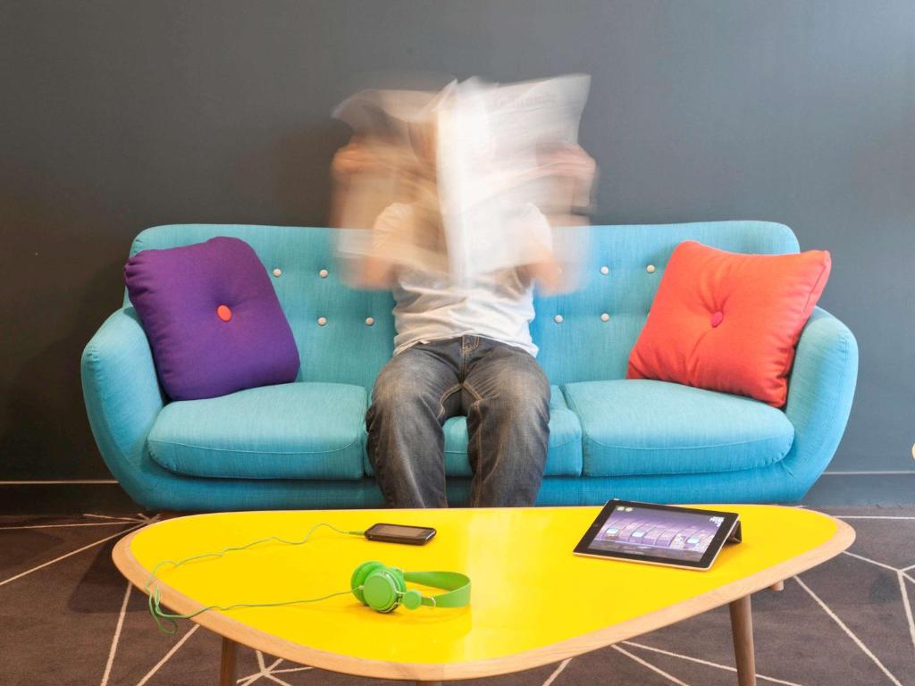 Posezení v ubytování ibis Styles Roanne Centre Gare