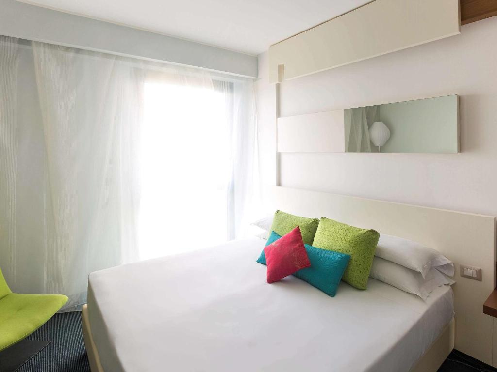 Letto o letti in una camera di Ibis Styles Roma Eur