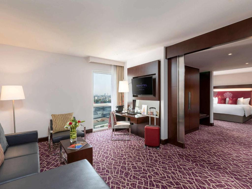 Voodi või voodid majutusasutuse Novotel Yangon Max toas