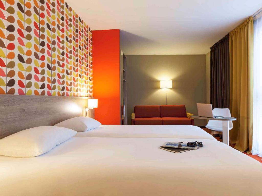 Postel nebo postele na pokoji v ubytování ibis Styles Chaumont Centre Gare