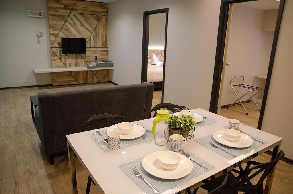 TV a/nebo společenská místnost v ubytování G5 HOTEL AND SERVICED APARTMENT