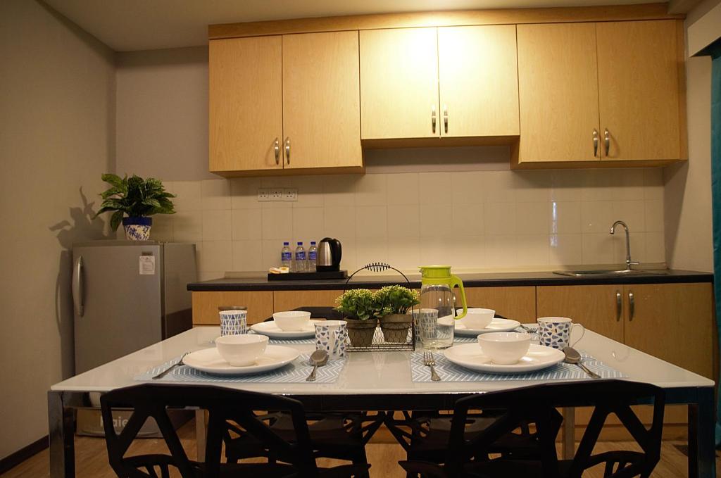 Kuchyň nebo kuchyňský kout v ubytování G5 HOTEL AND SERVICED APARTMENT