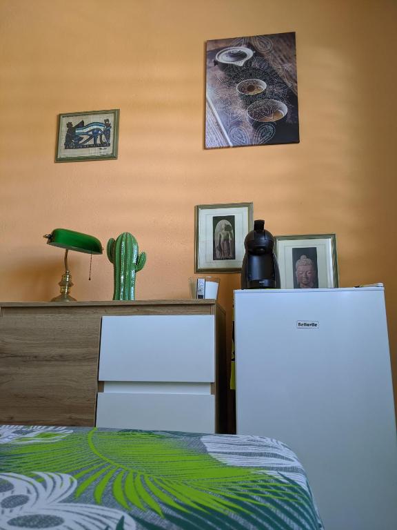 Postel nebo postele na pokoji v ubytování Villa Rosa Karibella