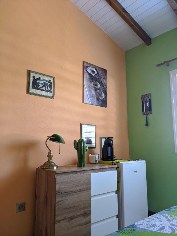 Postel nebo postele na pokoji v ubytování Villa Rosa Karibella