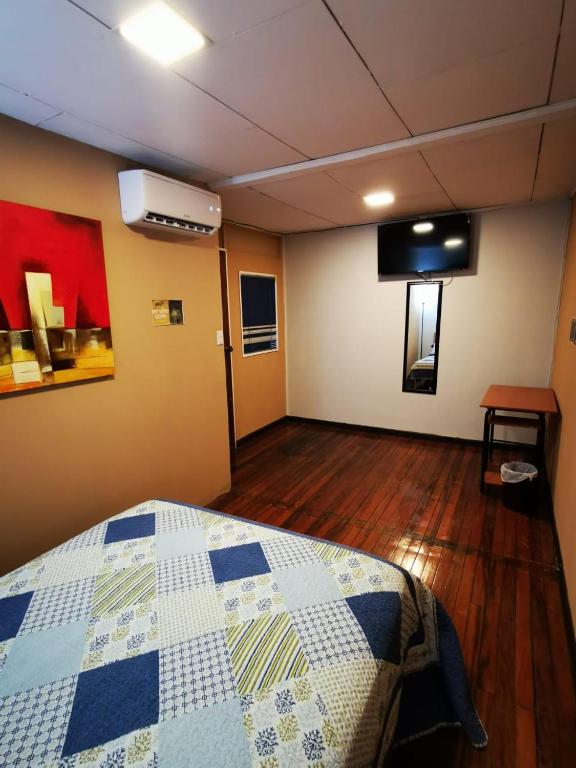 Postel nebo postele na pokoji v ubytování Toucan Hostel