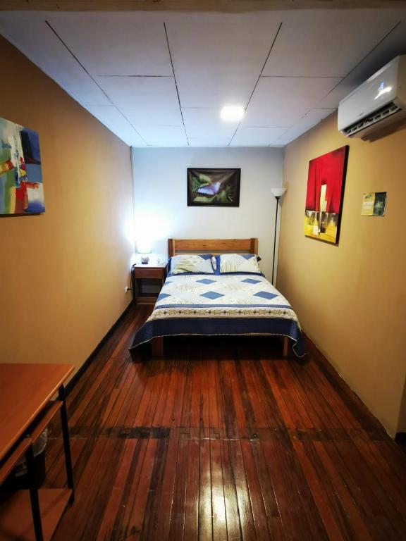 Postel nebo postele na pokoji v ubytování Toucan Hostel