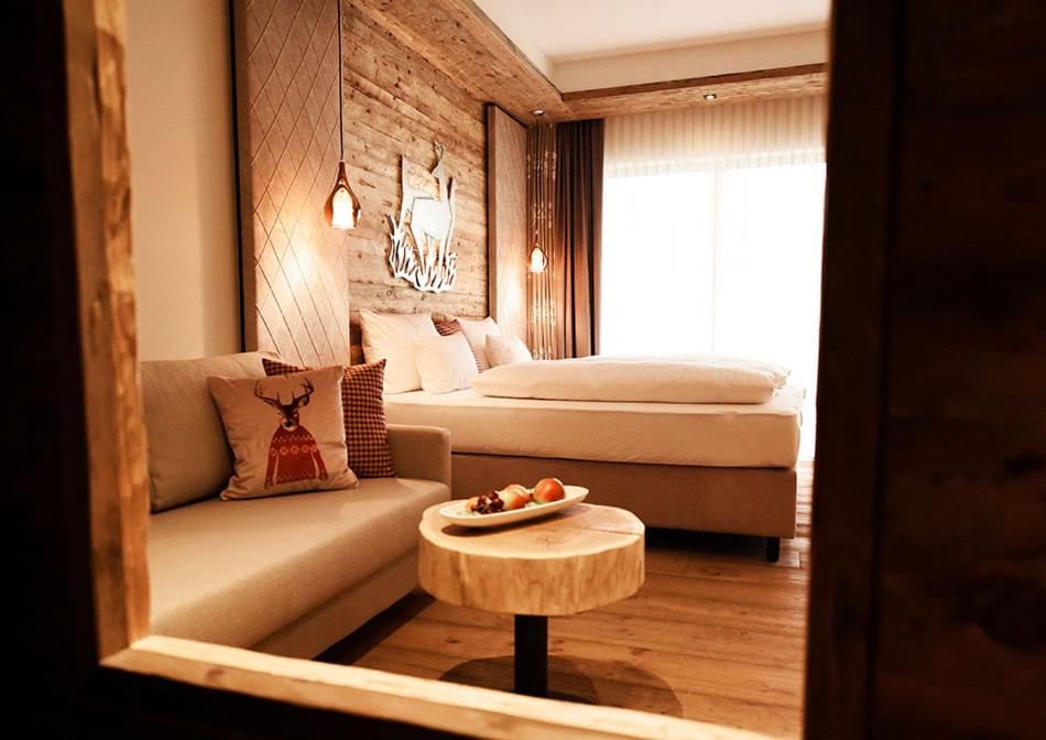 Postel nebo postele na pokoji v ubytování Spessart-Lodge