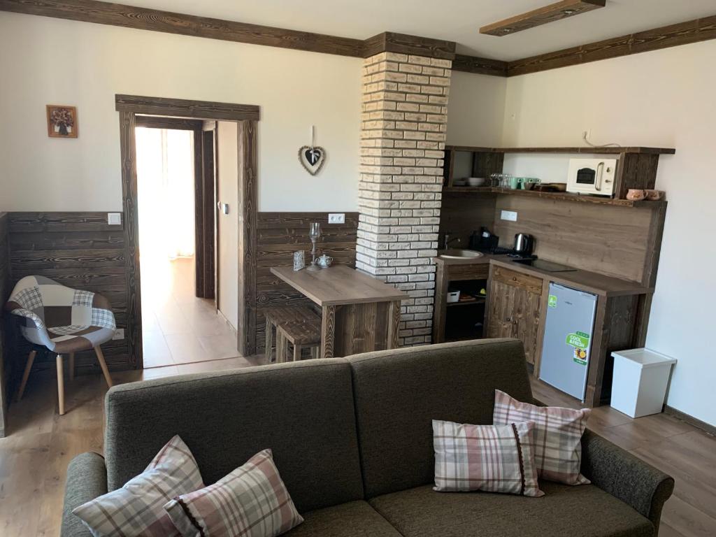 Kuchyň nebo kuchyňský kout v ubytování Apartmány Veternica v Bernarde