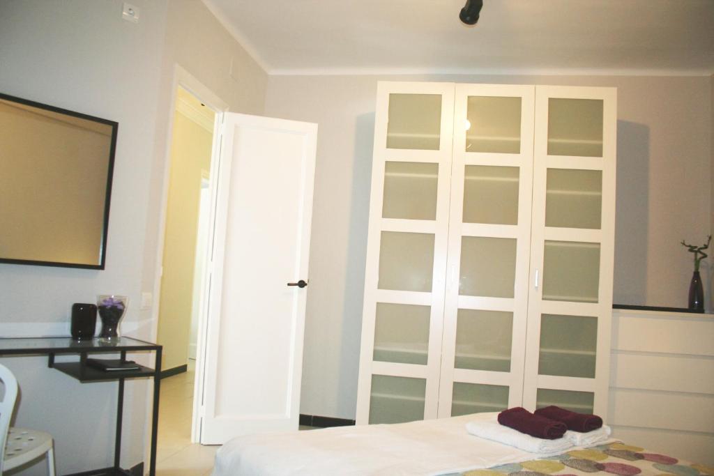 Posteľ alebo postele v izbe v ubytovaní Apartment Carrer Lepant