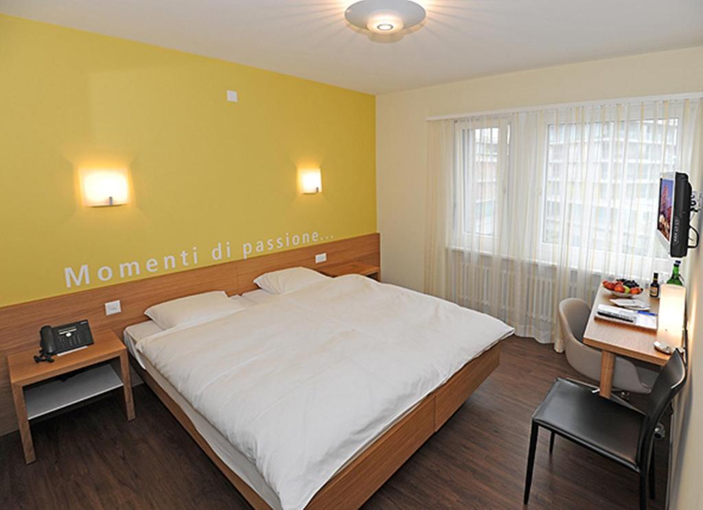 TV a/nebo společenská místnost v ubytování Sommerau-Ticino Swiss Quality Hotel