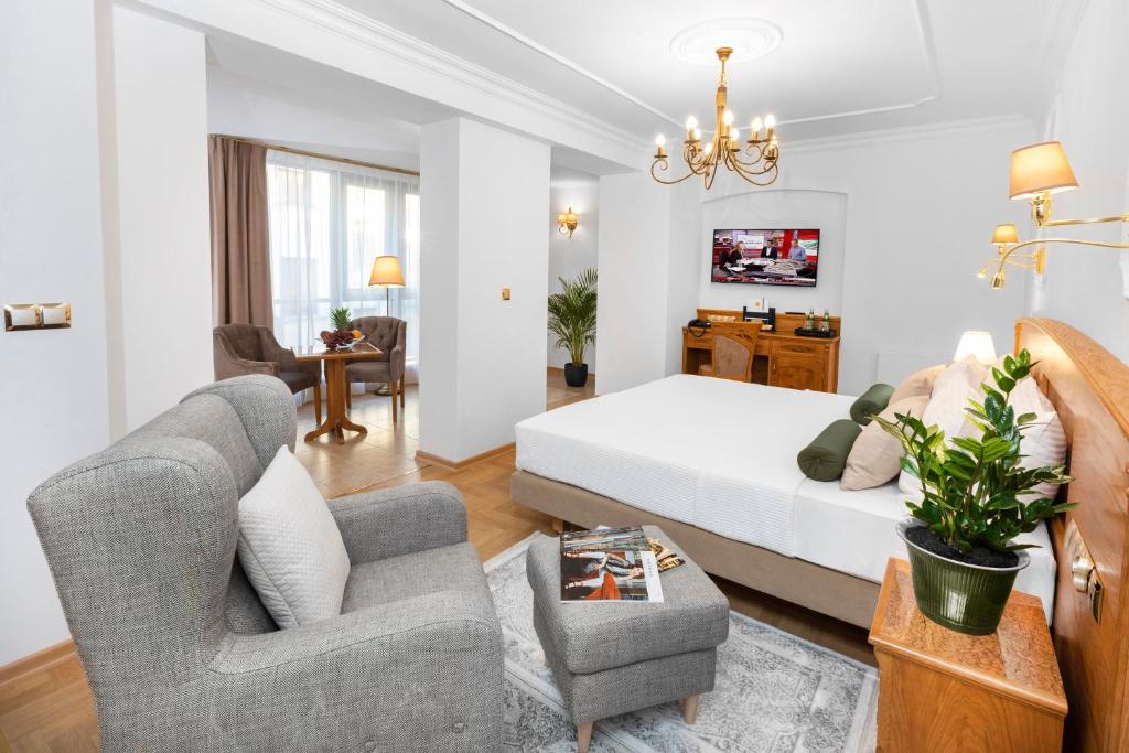 Postel nebo postele na pokoji v ubytování Ventus Rosa Boutique Aparthotel