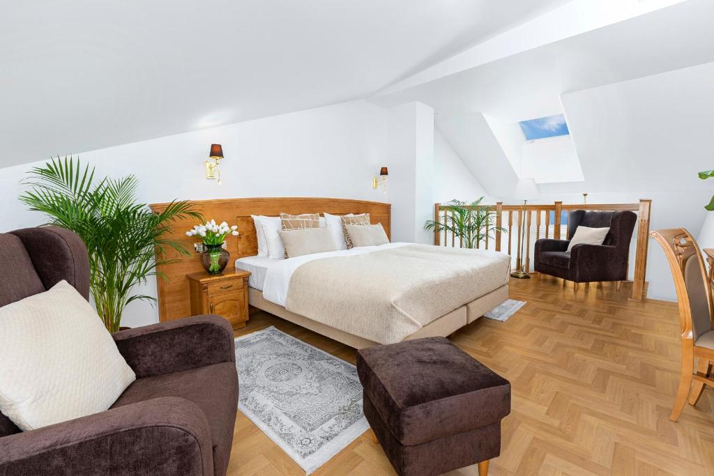 Postel nebo postele na pokoji v ubytování Ventus Rosa Boutique Aparthotel
