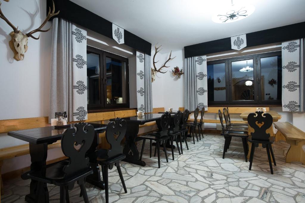 Reštaurácia alebo iné gastronomické zariadenie v ubytovaní Willa Pod Wierchami