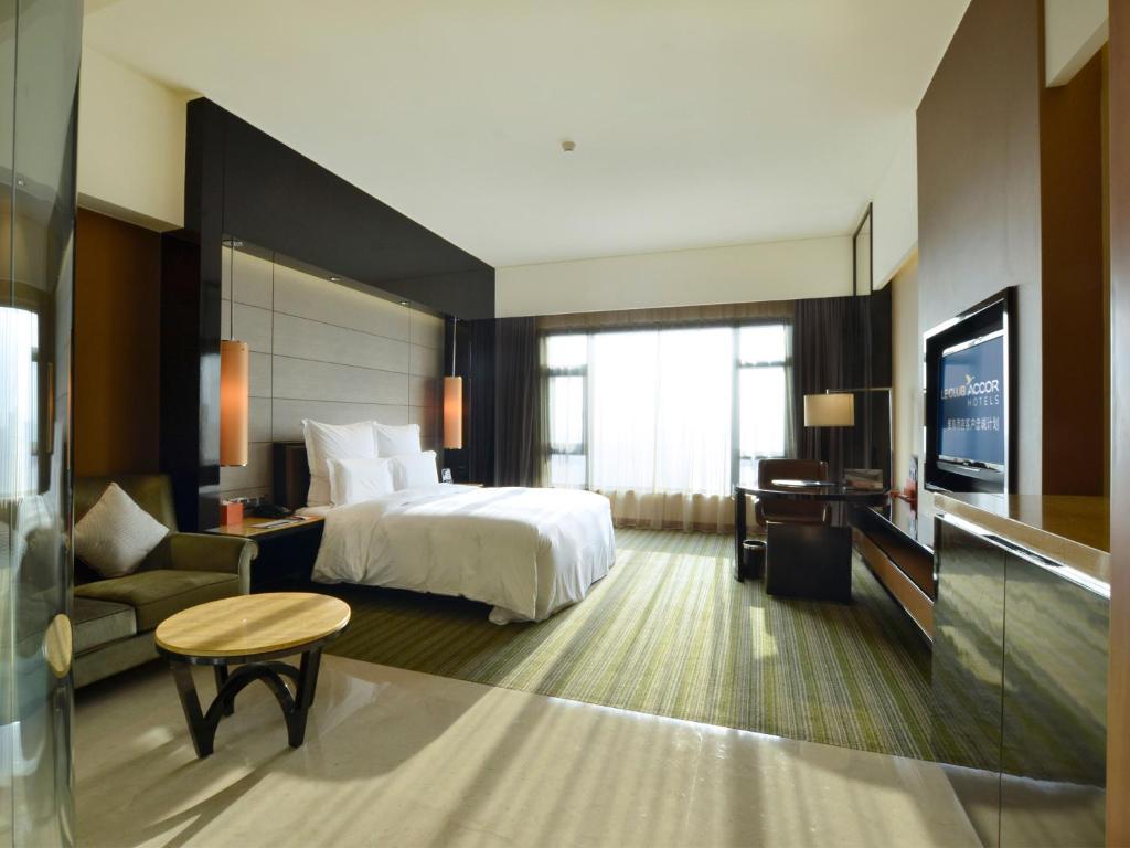 Postel nebo postele na pokoji v ubytování Pullman Dongguan Changan