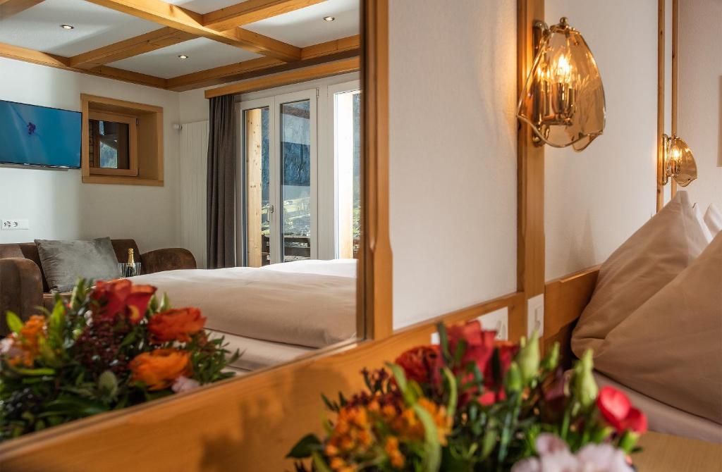 Postel nebo postele na pokoji v ubytování Hotel Silberhorn